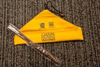 10th anniversary chopsticks crafted with College's motto. Price for each pair: $50.00.